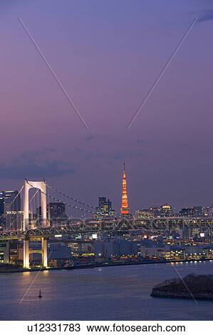 Stock Image - Rainbow Bridge and Tokyo Tower at Night. Fotosearch