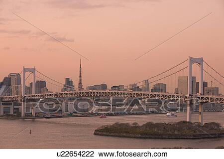 Stock Image - Rainbow Bridge and Tokyo Tower. Fotosearch