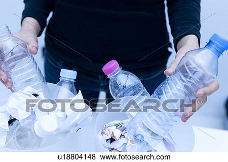 Separating paper and plastics View Large Photo Image Stock Photo - Separating paper and plastics. Fotosearch