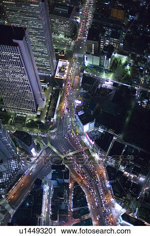 Stock Image - Shinjuku Skyscrapers and Motorway at Night. Fotosearch