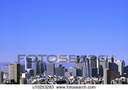 Stock Image - Skyline Skyscraper Architecture Mt. Fuji Clear Sky. Fotosearch