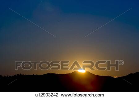 Stock Image - Sunset at Mount Tsukuba. Fotosearch