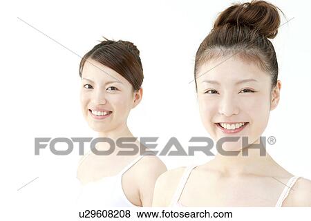 Stock Photo - Two Young Women. Fotosearch