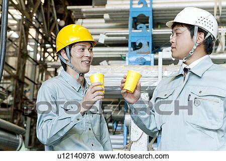 Warehouse Workers Having Coffee Break View Large Photo Image Stock Photo - Warehouse Workers Having Coffee Break. Fotosearch
