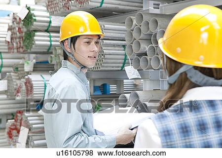 Warehouse Workers Talking View Large Photo Image Stock Photo - Warehouse Workers Talking. Fotosearch