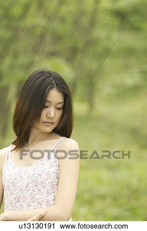 Young Woman Looking Down View Large Photo Image Stock Image - Young Woman Looking Down. Fotosearch