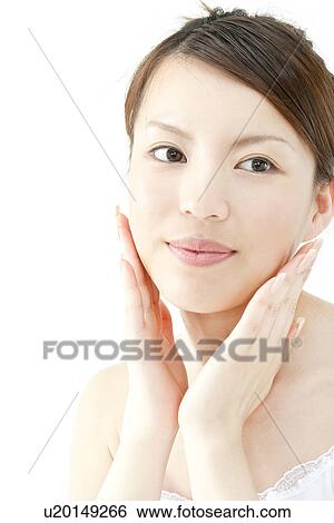 Young Woman Touching Her Face View Large Photo Image Stock Photograph - Young Woman Touching Her Face. Fotosearch