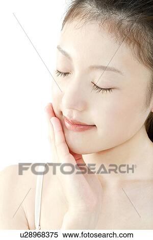 Young Woman Touching Her Face View Large Photo Image Stock Photography - Young Woman Touching Her Face. Fotosearch