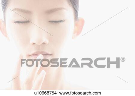 Young Woman Touching Her Lips View Large Photo Image Picture - Young Woman Touching Her Lips. Fotosearch