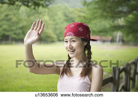 Young Woman Waving Hands View Large Photo Image Stock Photograph - Young Woman Waving Hands. Fotosearch