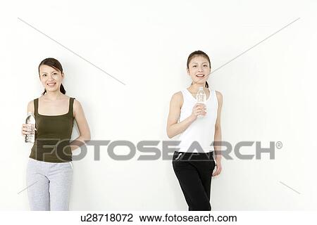 Young Women Drinking Water Bottle View Large Photo Image Stock Image - Young Women Drinking Water Bottle. Fotosearch