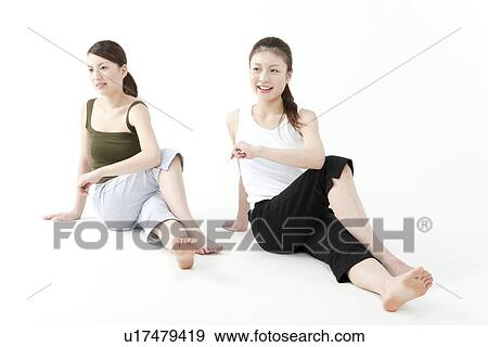 Young Women Stretching View Large Photo Image Stock Photo - Young Women Stretching. Fotosearch