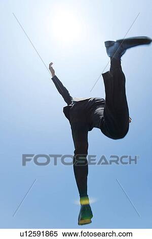 A businessman jumping View Large Photo Image Stock Photography - A businessman jumping. Fotosearch