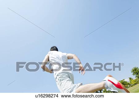 Picture - An athlete running. Fotosearch