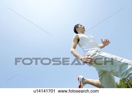 Stock Image - An athlete running. Fotosearch