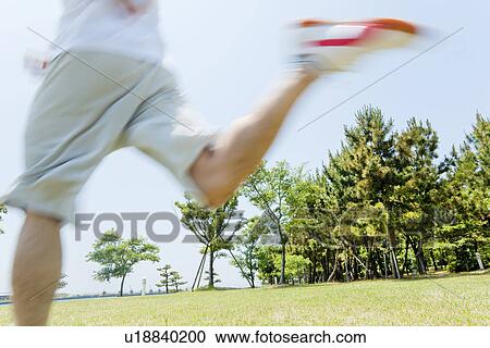 Stock Image - An athlete running. Fotosearch