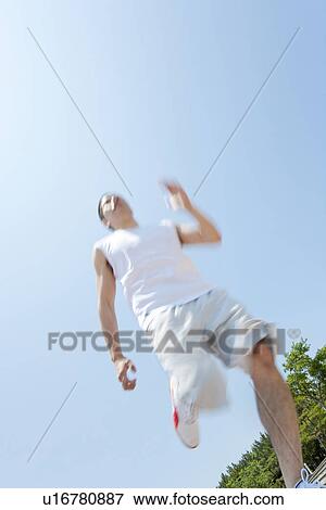 Stock Photo - An athlete running. Fotosearch