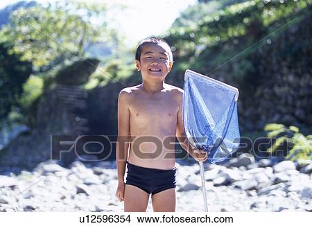Picture - Boy with Butterfly Net. Fotosearch