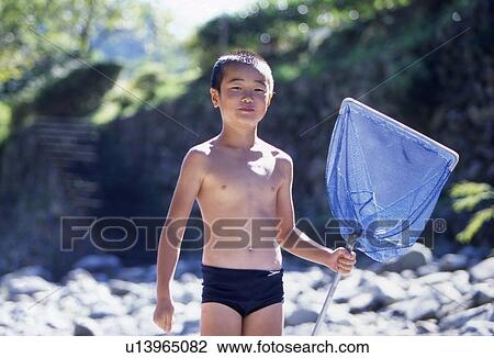 Stock Image - Boy with Butterfly Net. Fotosearch