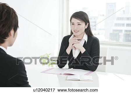 Business people in the meeting View Large Photo Image Stock Photo - Business people in the meeting. Fotosearch