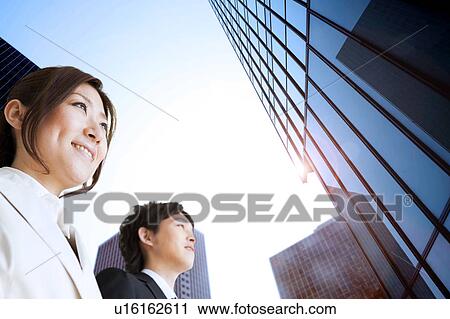 Stock Image - Business people. Fotosearch