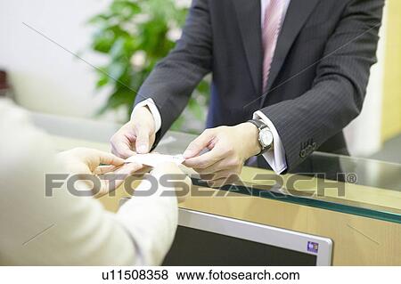 Businessman exchanging business card View Large Photo Image Stock Photo - Businessman exchanging business card. Fotosearch
