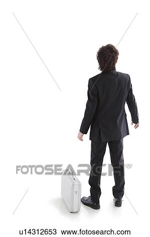 Stock Image - Businessman, high angle view. Fotosearch