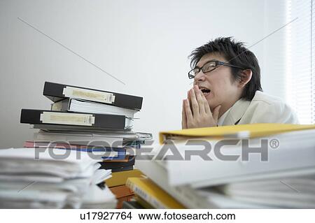 Businessman in the office View Large Photo Image Picture - Businessman in the office. Fotosearch
