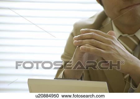 Stock Image - Businessman in the office. Fotosearch