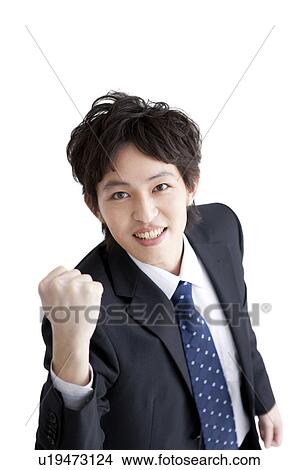 Picture - Businessman making a fist. Fotosearch