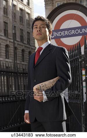 Businessman Outside Undeground Station View Large Photo Image Stock Image - Businessman Outside Undeground Station. Fotosearch