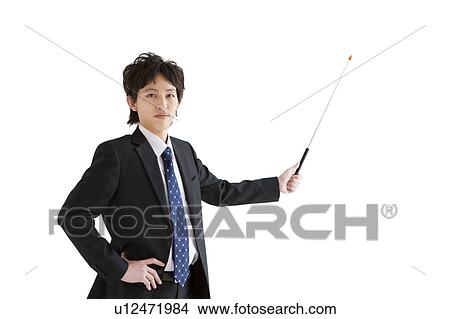 Businessman pointing with pointer View Large Photo Image Picture - Businessman pointing with pointer. Fotosearch