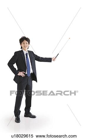Stock Photography - Businessman pointing with pointer. Fotosearch