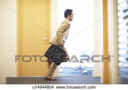 Businessman Running View Large Photo Image Picture - Businessman Running. Fotosearch