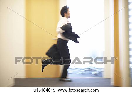 Stock Photography - Businessman Running. Fotosearch