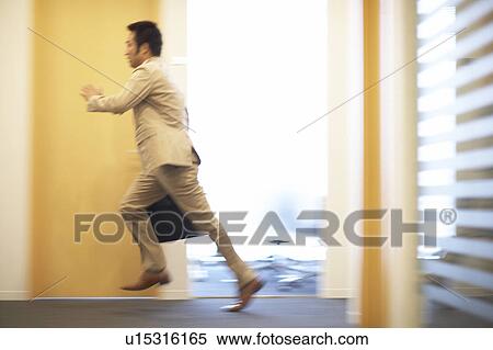 Stock Photography - Businessman Running. Fotosearch