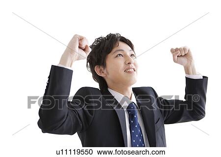 Stock Image - Businessman with arms raised. Fotosearch