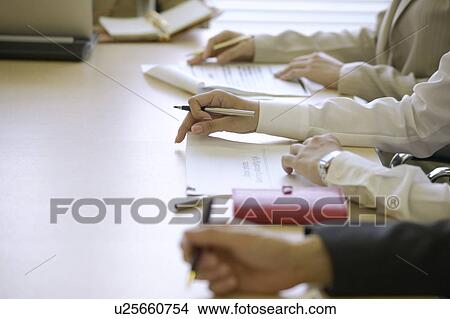 Picture - Businesspeople having a meeting. Fotosearch