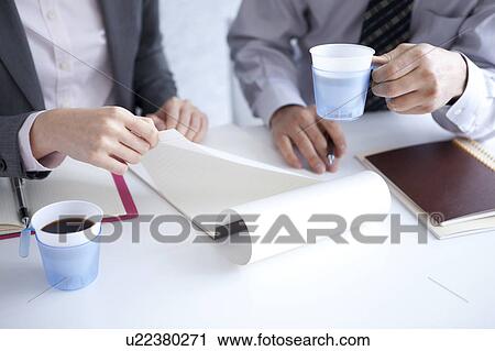 Businesspeople having a meeting View Large Photo Image Stock Image - Businesspeople having a meeting. Fotosearch