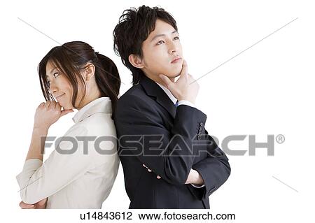 Businesspeople standing back to back View Large Photo Image Stock Image - Businesspeople standing back to back. Fotosearch