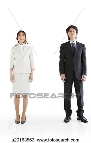 Stock Image - Businesspeople standing. Fotosearch