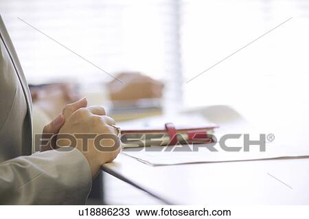 Businesswoman during a meeting View Large Photo Image Stock Image - Businesswoman during a meeting. Fotosearch