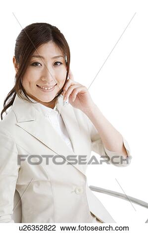 Businesswoman on cell phone View Large Photo Image Stock Image - Businesswoman on cell phone. Fotosearch