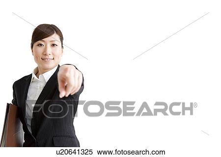 Stock Photography - Businesswoman pointing. Fotosearch
