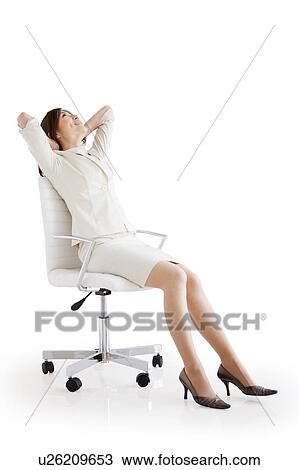 Stock Image - Businesswoman relaxing. Fotosearch