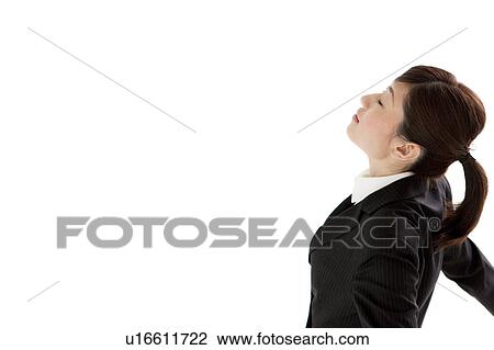 Businesswoman taking deep breath View Large Photo Image Stock Image - Businesswoman taking deep breath. Fotosearch