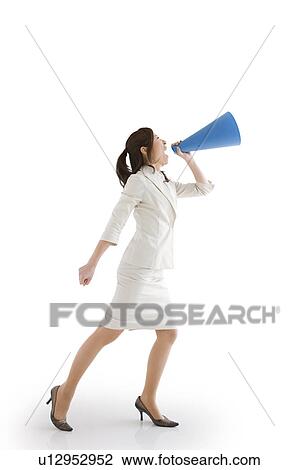 Businesswoman with a megaphone View Large Photo Image Stock Image - Businesswoman with a megaphone. Fotosearch