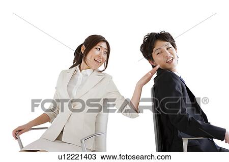Businesswoman with hand on businessman's shoulder View Large Photo Image Stock Image - Businesswoman with hand on businessman's shoulder. Fotosearch