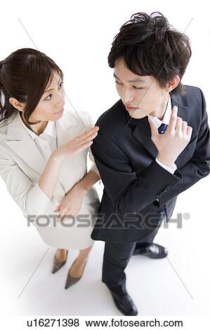 Businesswoman with hand on businessman's shoulder View Large Photo Image Stock Photo - Businesswoman with hand on businessman's shoulder. Fotosearch