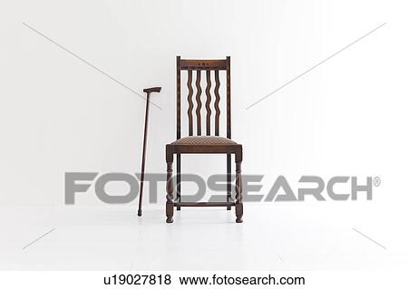 Chair and walking cane View Large Photo Image Stock Photo - Chair and walking cane. Fotosearch